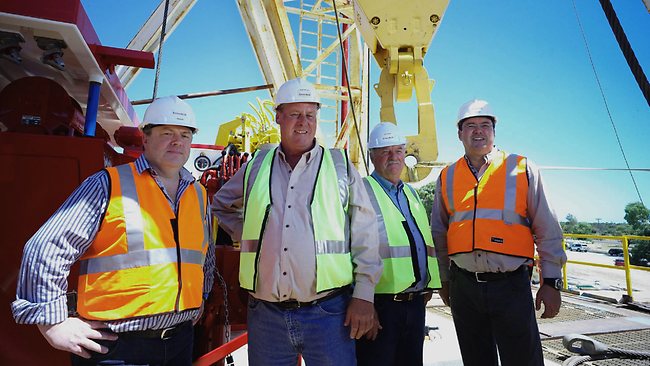 Picture: From left, Enerdrill chairman Dermot O'Keeffe, managing director John Wells, director Jim Currie and director Eddie Rigg with one of their drilling rigs Source: The Australian [Supplied]